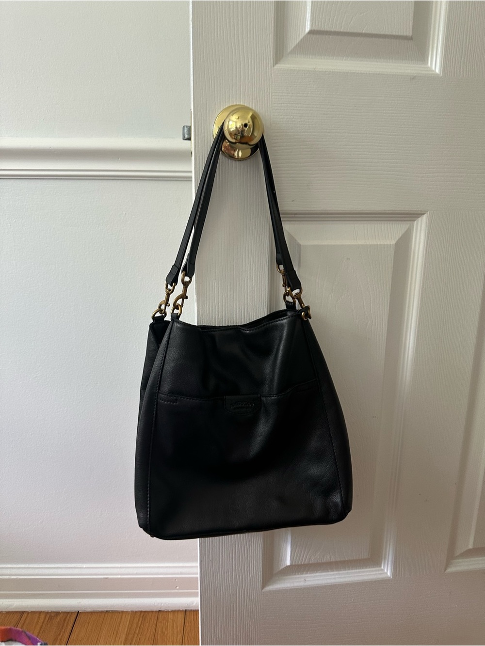 Classic Black Leather Shoulder Bag with Gold Accents